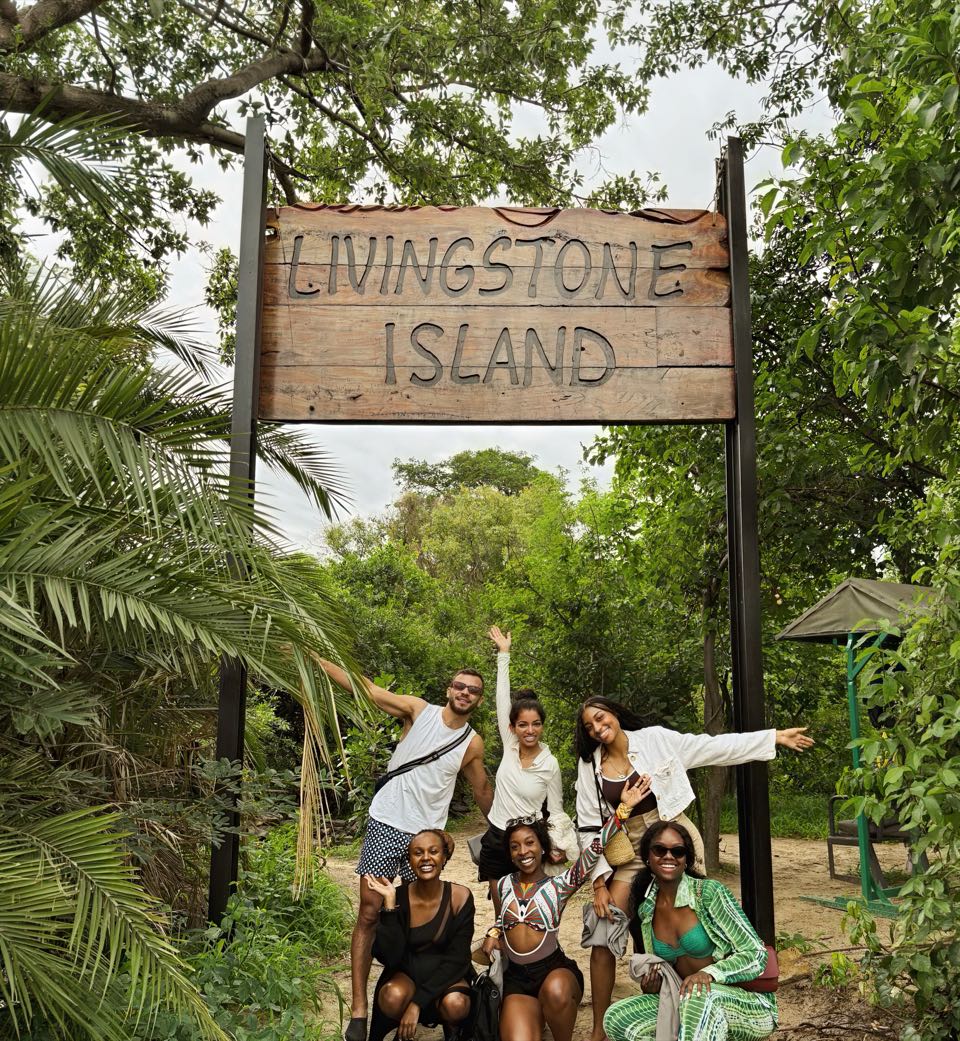 Members of the Zuvani Collective community together at Livingstone Island