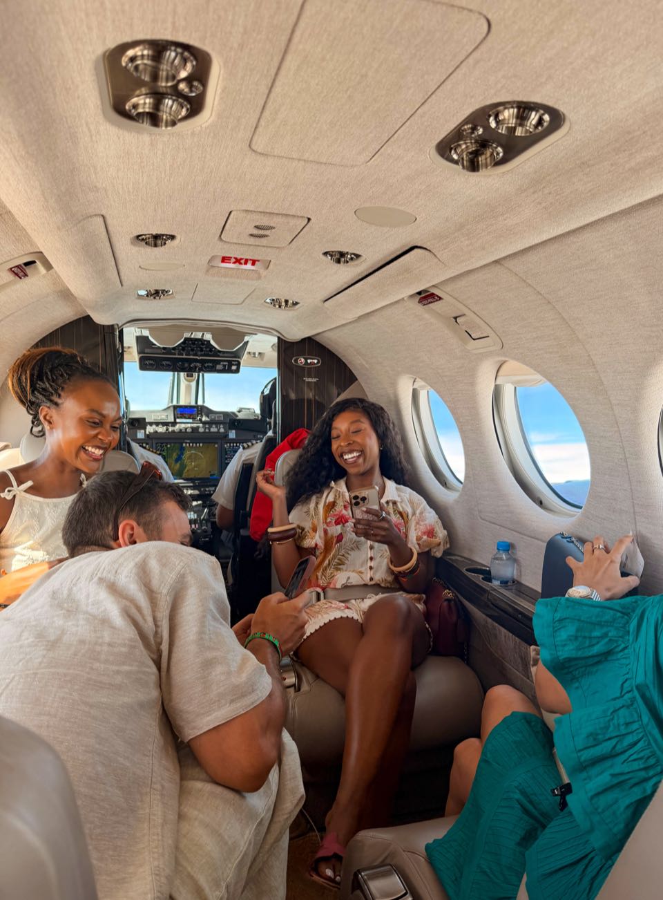 Travellers sitting together in the cabin of a small plane